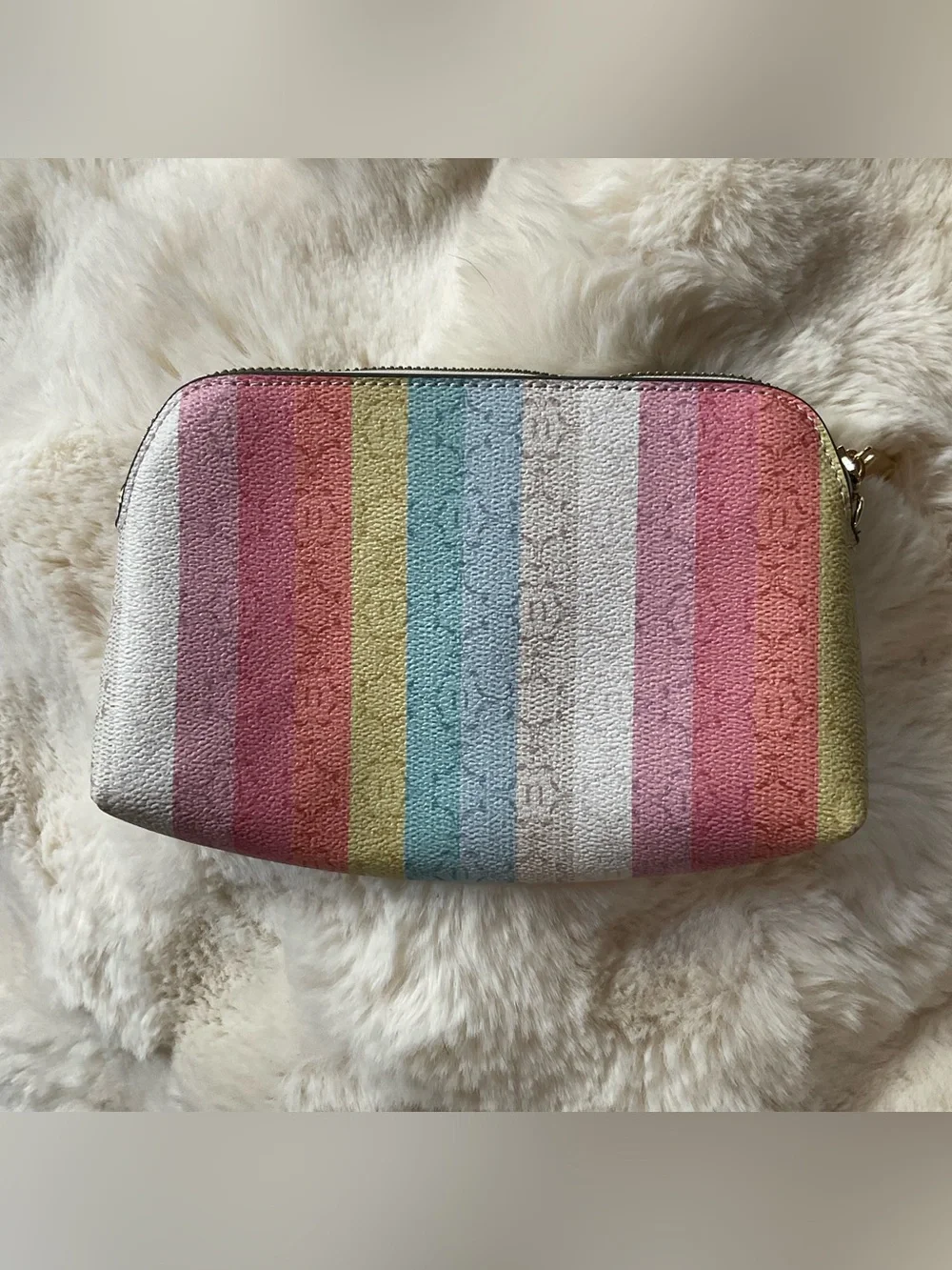 Nanette Lepore cosmetic bag w/ rainbow stripped pattern, zip closure, EUC